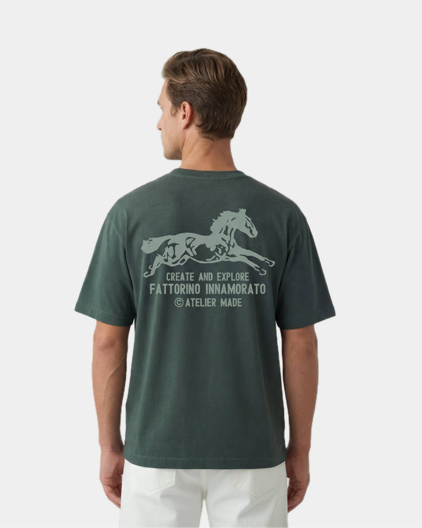Green t-shirt with a horse graphic and text on the back against a white background. Fattorino Innamorato cavallo green