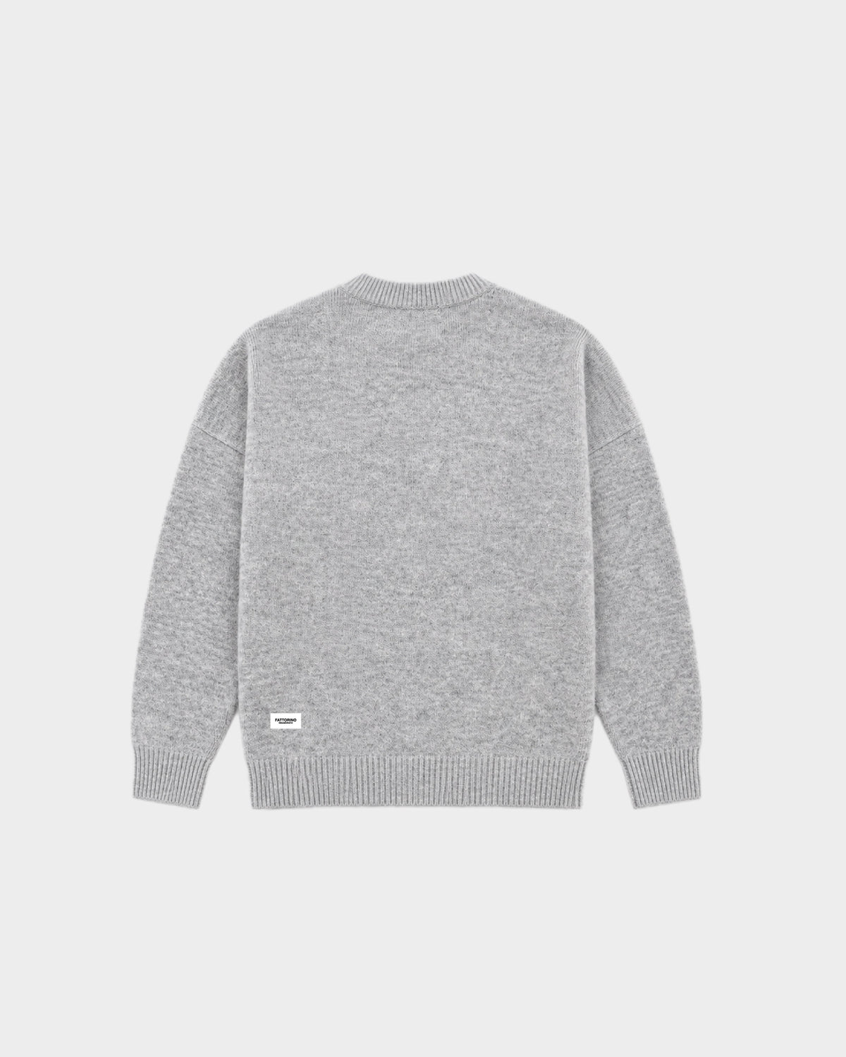 A light grey heathered knit crewneck sweater with ribbed cuffs and hem, displayed flat against a light gray background. Fattorino Innamorato grey knitwear sweaeter 