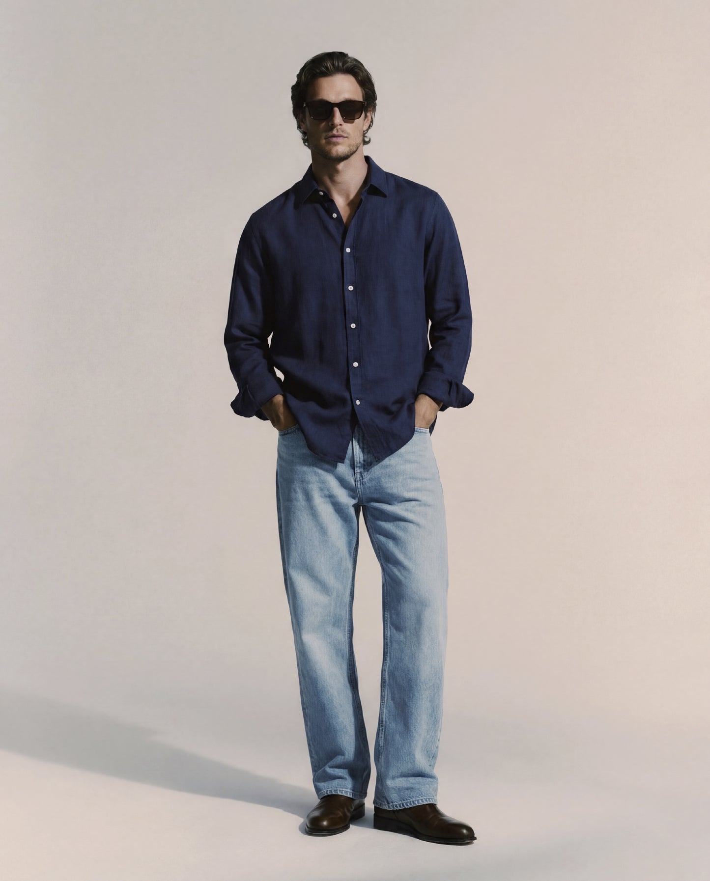 Navy blue button-up shirt on a light gray background. Fattorino Innamorato navy oxford blouse shirt 