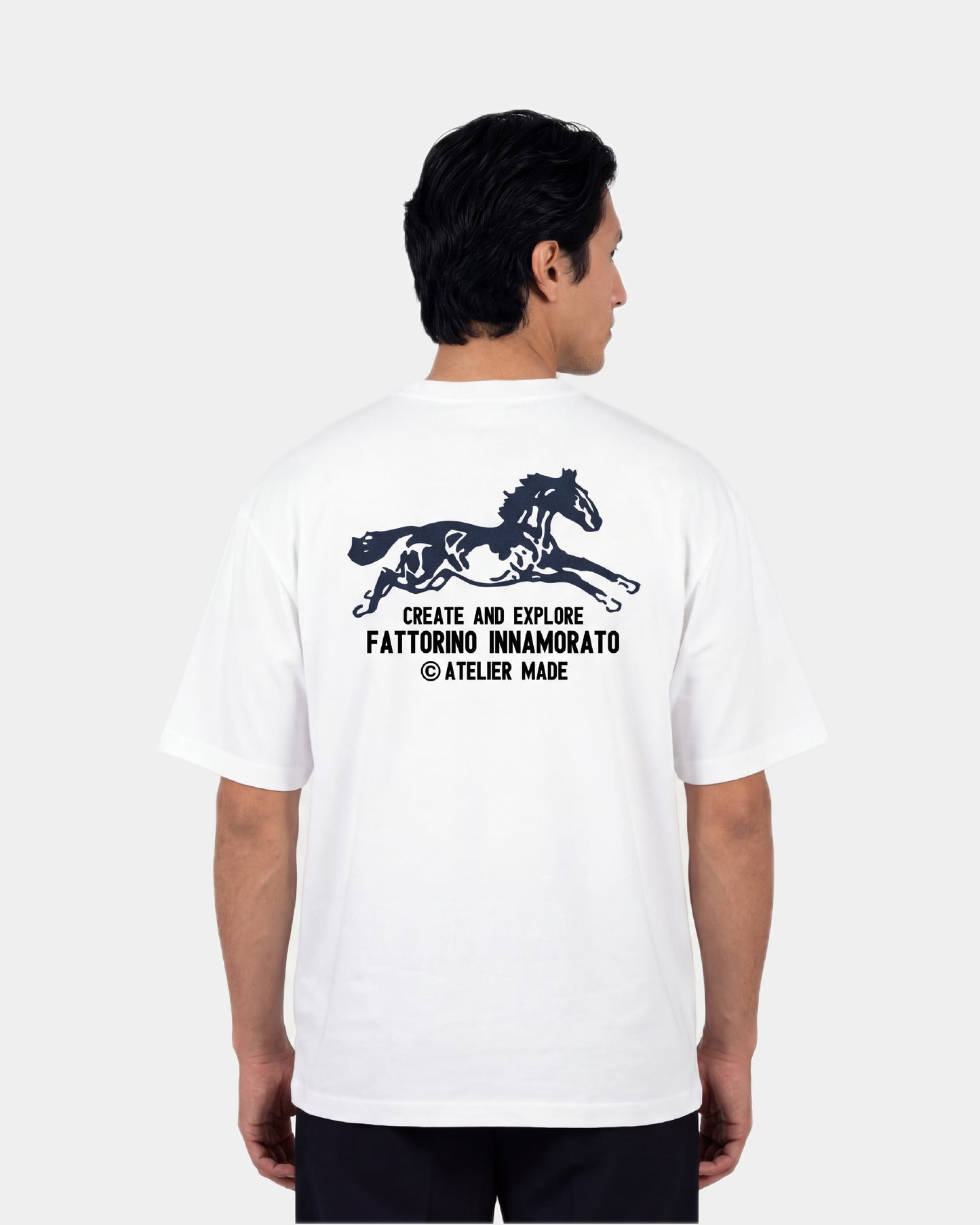 White t-shirt with black horse graphic and text on a white background. Fattorino Innamorato Cavallo White