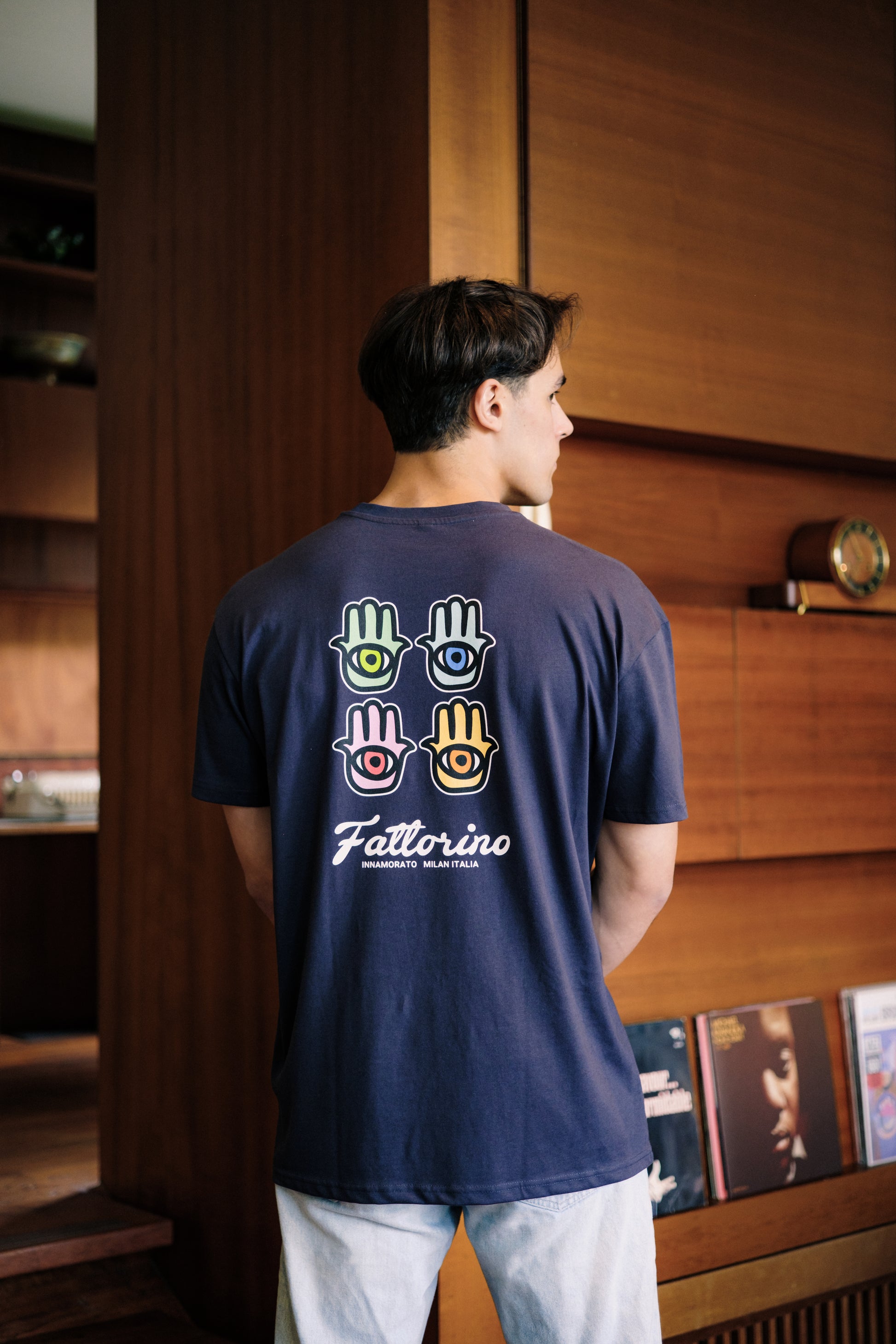 Navy blue tshirt with colorful hamsa hands fattorino innamorato  back