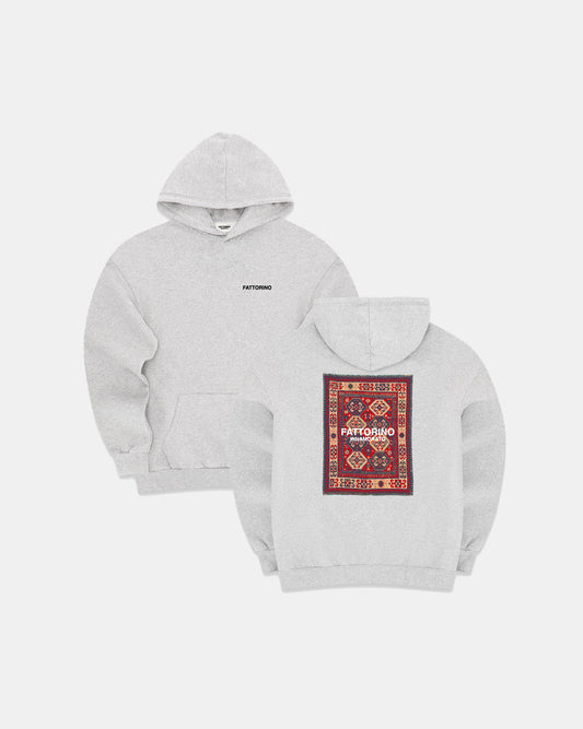 Gray hoodie with a patterned indian rug design on a white background. Fattorino Innamorato