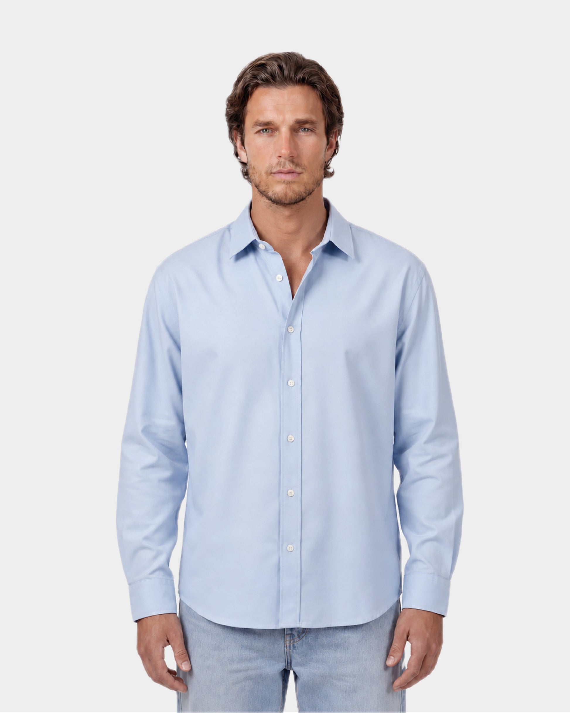 Light blue Fattorino Innamorato shirt. Man wearing jeans and oxford shirt 